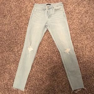 light wash distressed jeans